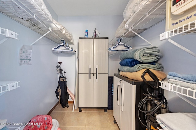 1000 N Atlantic Ave Unit 614, Cocoa Beach, FL 32931 - spacious closet with light tile patterned floors