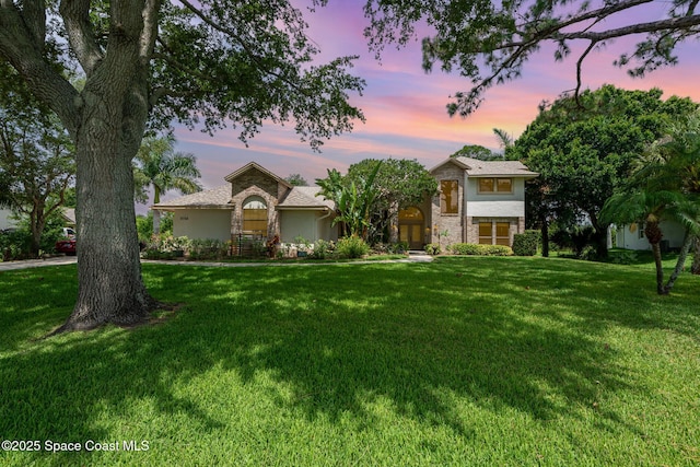 3750 Shady Run Rd, Melbourne, FL 32934 - view of front of house featuring a front lawn and stucco siding