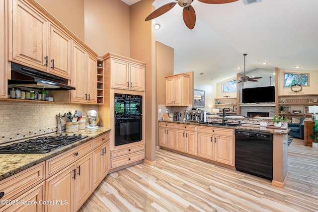 3750 Shady Run Rd, Melbourne, FL 32934 - kitchen with a ceiling fan, black appliances, a sink, light brown cabinets, and open floor plan