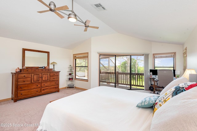 3750 Shady Run Rd, Melbourne, FL 32934 - bedroom featuring access to exterior, light carpet, multiple windows, baseboards, and high vaulted ceiling