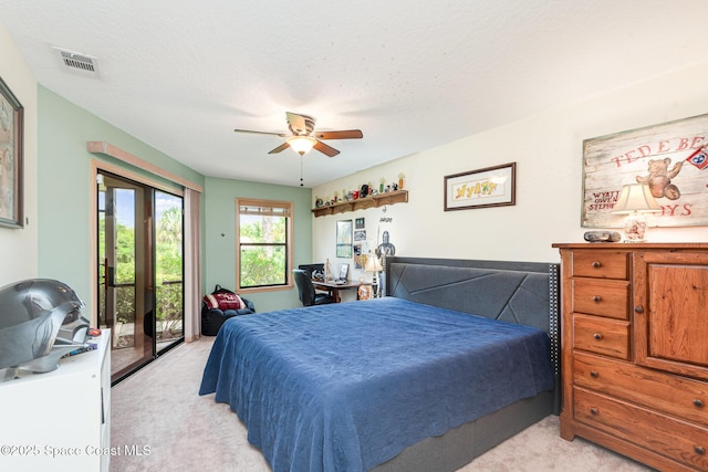 3750 Shady Run Rd, Melbourne, FL 32934 - bedroom featuring light carpet, access to outside, and ceiling fan