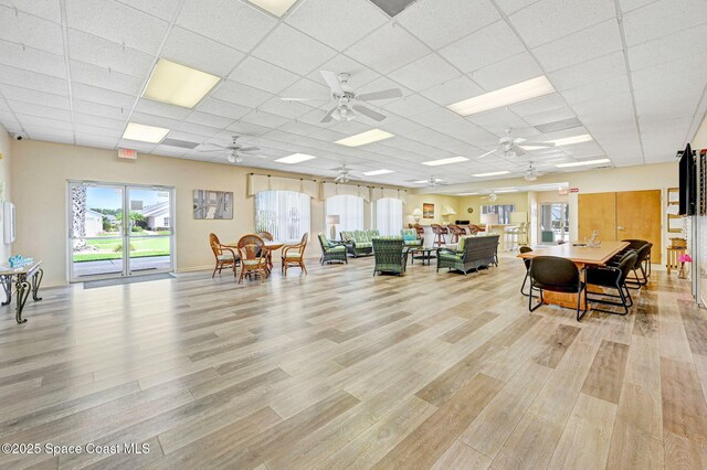 638 Brockton Way W, Melbourne, FL 32904 - misc room featuring light wood finished floors, a ceiling fan, and a drop ceiling