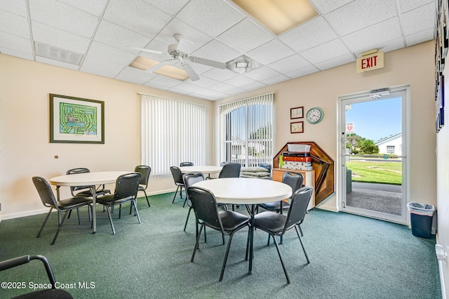 638 Brockton Way W, Melbourne, FL 32904 - carpeted dining area featuring a drop ceiling, ceiling fan, and baseboards