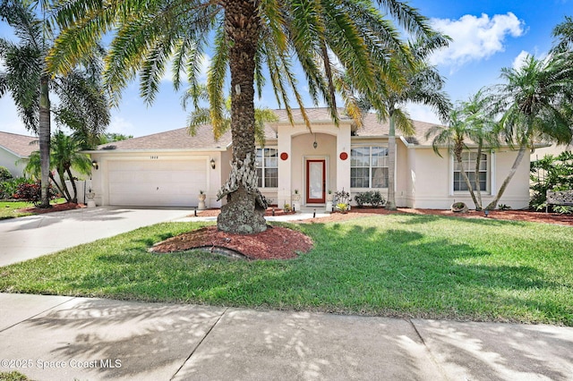 1068 Egret Lake Way, Melbourne, FL 32940 - ranch-style house featuring stucco siding, concrete driveway, a garage, and a front lawn
