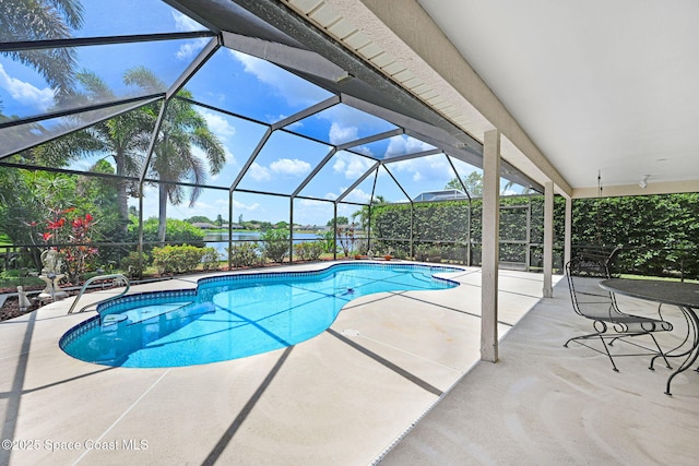 1068 Egret Lake Way, Melbourne, FL 32940 - swimming pool featuring a patio area and a water view
