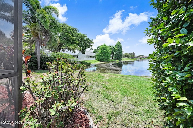 1068 Egret Lake Way, Melbourne, FL 32940 - view of green lawn with a water view