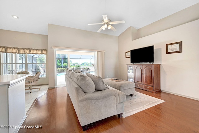 1068 Egret Lake Way, Melbourne, FL 32940 - living room with wood finished floors, healthy amount of natural light, a ceiling fan, baseboards, and recessed lighting