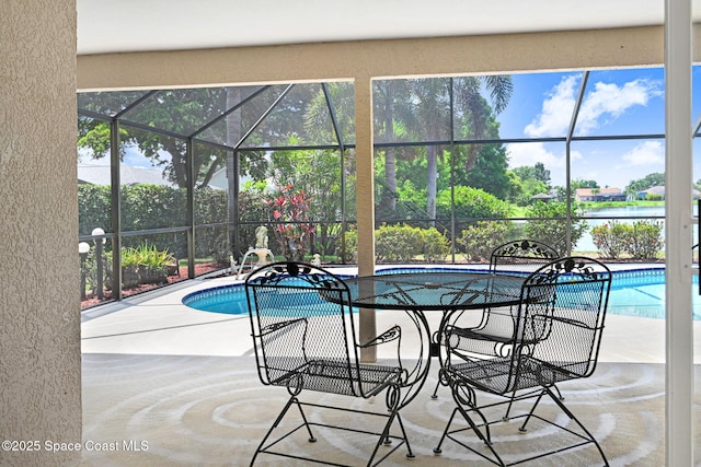 1068 Egret Lake Way, Melbourne, FL 32940 - swimming pool featuring a patio, glass enclosure, and a water view