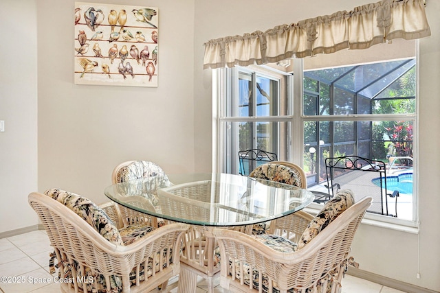 1068 Egret Lake Way, Melbourne, FL 32940 - dining area featuring tile patterned flooring and baseboards