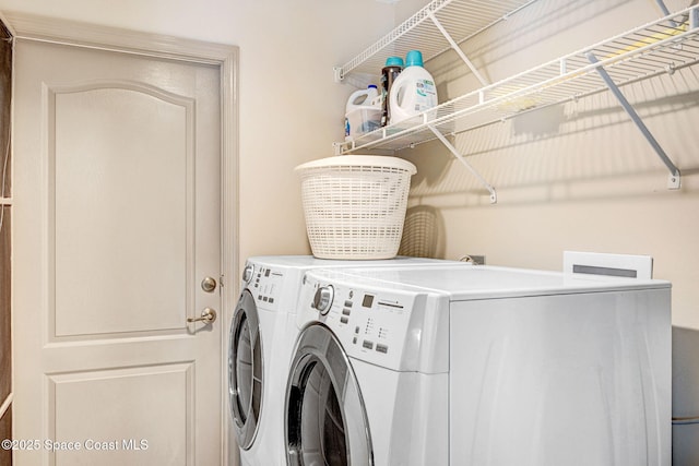 1068 Egret Lake Way, Melbourne, FL 32940 - laundry area featuring washer and clothes dryer