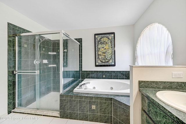 1068 Egret Lake Way, Melbourne, FL 32940 - bathroom with a whirlpool tub, a stall shower, a sink, and tile patterned flooring