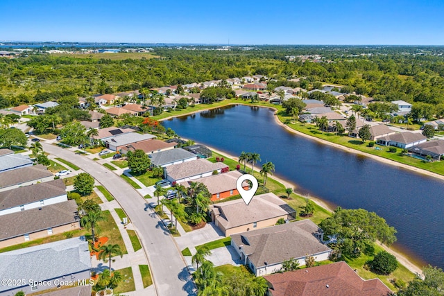 1223 Brumpton Pl, Rockledge, FL 32955 - aerial overview of property's location with nearby suburban area and a large body of water