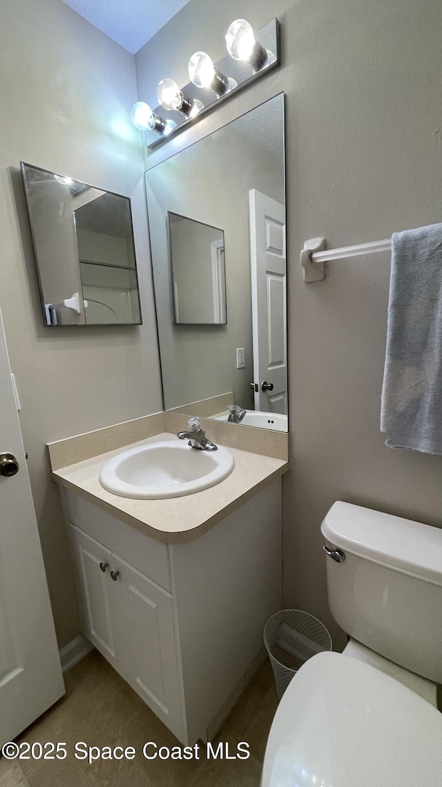 975 Luminary Cir Unit 103, Melbourne, FL 32901 - bathroom with vanity and toilet