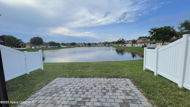 975 Luminary Cir Unit 103, Melbourne, FL 32901 - view of patio with a water view