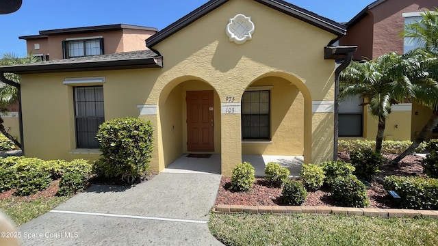 975 Luminary Cir Unit 103, Melbourne, FL 32901 - view of front of property with stucco siding