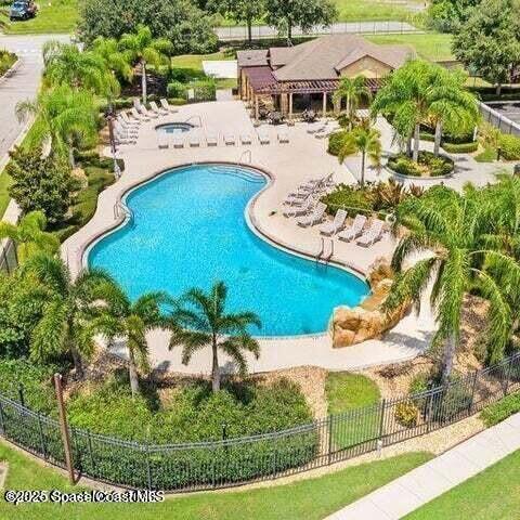 975 Luminary Cir Unit 103, Melbourne, FL 32901 - community pool with a patio and a community hot tub