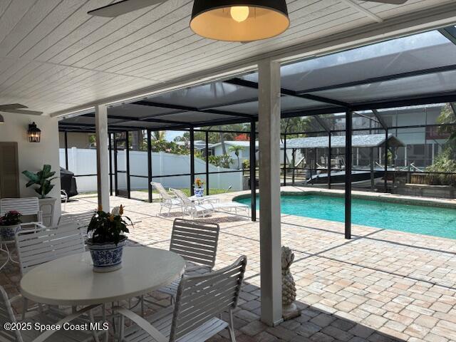 60 Alhambra Dr, Merritt Island, FL 32952 - view of swimming pool with a patio and a lanai