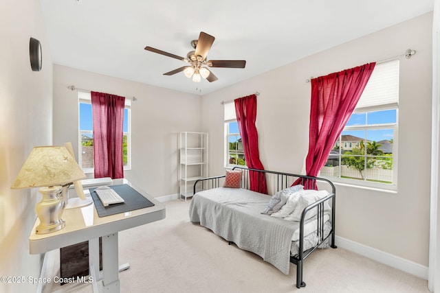 2810 Amethyst Way, Melbourne, FL 32940 - carpeted bedroom featuring multiple windows and a ceiling fan