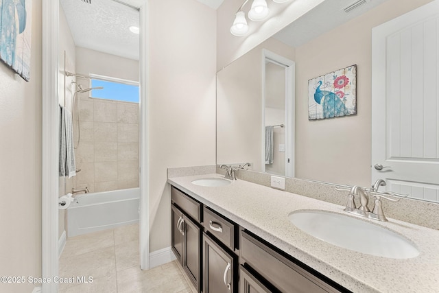 2810 Amethyst Way, Melbourne, FL 32940 - bathroom featuring double vanity, tile patterned flooring, and shower / bathtub combination