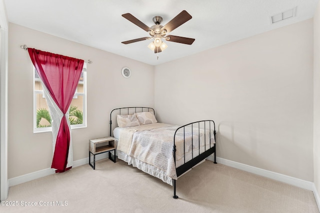 2810 Amethyst Way, Melbourne, FL 32940 - carpeted bedroom with baseboards and a ceiling fan