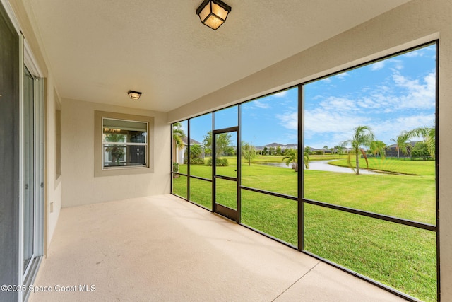 2810 Amethyst Way, Melbourne, FL 32940 - unfurnished sunroom with a water view