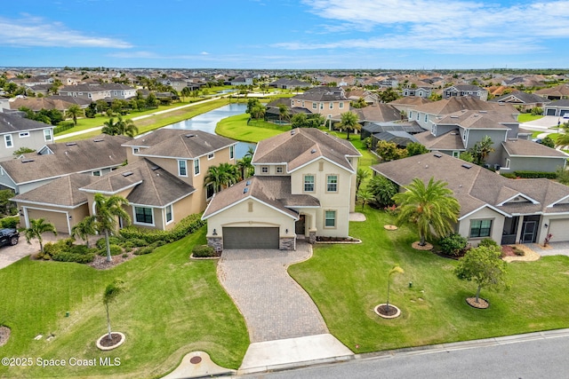 2810 Amethyst Way, Melbourne, FL 32940 - aerial perspective of suburban area with a large body of water