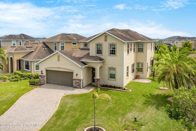 2810 Amethyst Way, Melbourne, FL 32940 - view of front facade featuring stucco siding, a garage, decorative driveway, and a residential view