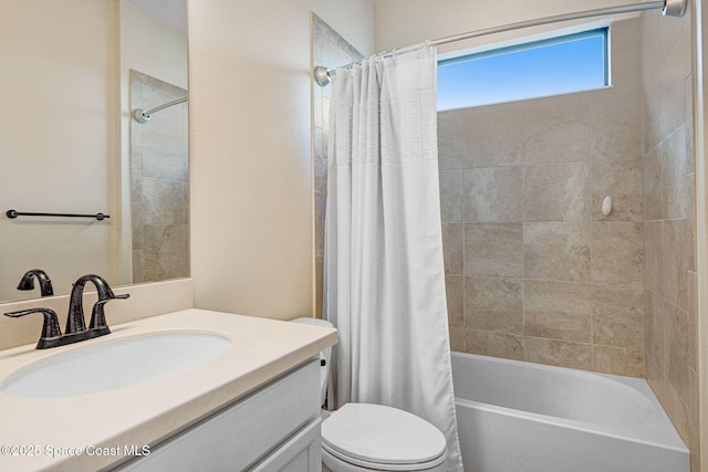 8212 Paragrass Ave, Melbourne, FL 32940 - full bath featuring vanity, shower / bath combo with shower curtain, and toilet