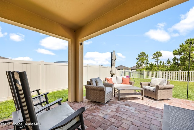 637 Old Country Rd SE, Palm Bay, FL 32909 - fenced backyard with outdoor lounge area and a patio area