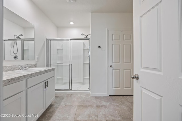 637 Old Country Rd SE, Palm Bay, FL 32909 - bathroom featuring a stall shower and vanity