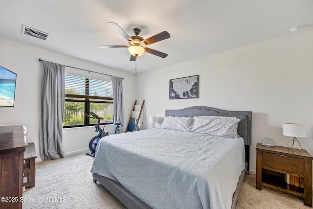 637 Old Country Rd SE, Palm Bay, FL 32909 - bedroom with light colored carpet, baseboards, and ceiling fan