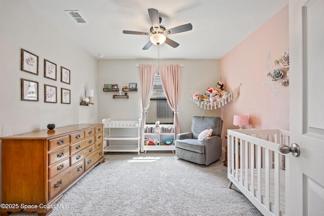 637 Old Country Rd SE, Palm Bay, FL 32909 - carpeted bedroom featuring a nursery area and a ceiling fan