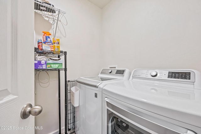 637 Old Country Rd SE, Palm Bay, FL 32909 - laundry room featuring separate washer and dryer