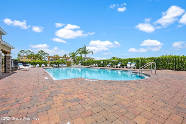 637 Old Country Rd SE, Palm Bay, FL 32909 - community pool featuring a patio area