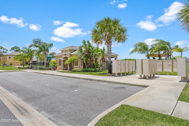 637 Old Country Rd SE, Palm Bay, FL 32909 - view of asphalt road featuring sidewalks and curbs