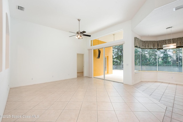 2703 Barrow Dr, Merritt Island, FL 32952 - tiled empty room with a ceiling fan
