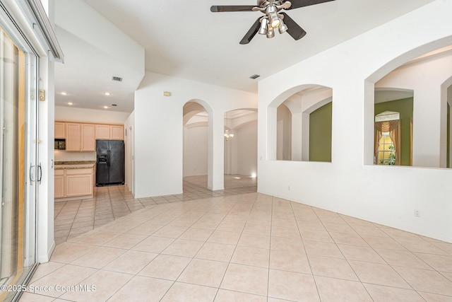 2703 Barrow Dr, Merritt Island, FL 32952 - spare room featuring a ceiling fan, light tile patterned floors, recessed lighting, and arched walkways