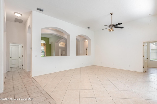 2703 Barrow Dr, Merritt Island, FL 32952 - spare room with ceiling fan and light tile patterned floors
