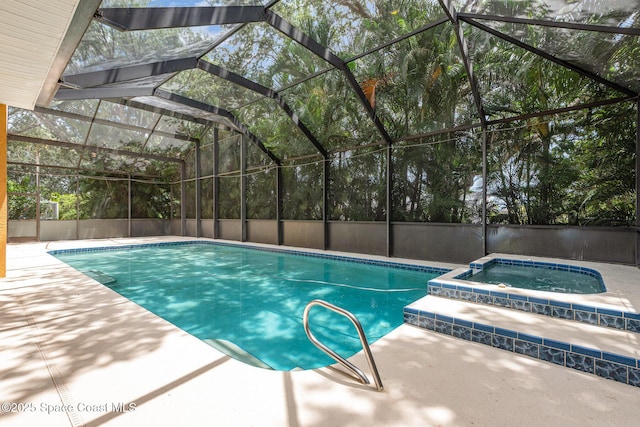 2703 Barrow Dr, Merritt Island, FL 32952 - swimming pool featuring an in-ground hot tub, a patio, and glass enclosure