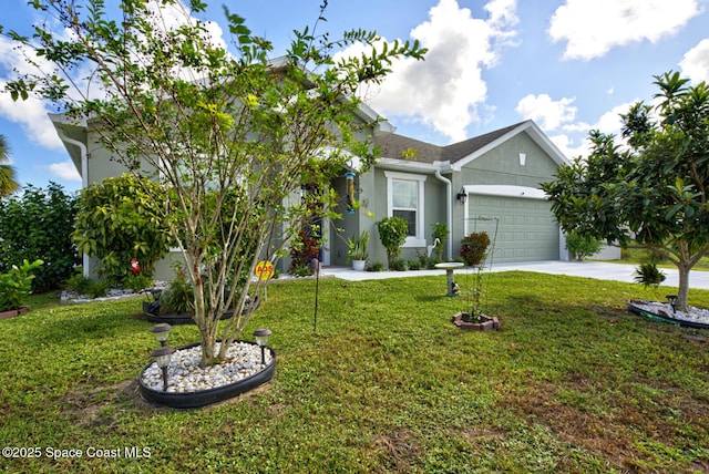 469 Aviation Ave NE, Palm Bay, FL 32907 - view of front of home featuring a garage, stucco siding, concrete driveway, and a front yard