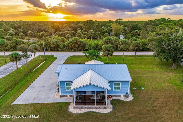 5853 Goldrush Ave, Grant-Valkaria, FL 32949 - aerial view at dusk of a wooded view