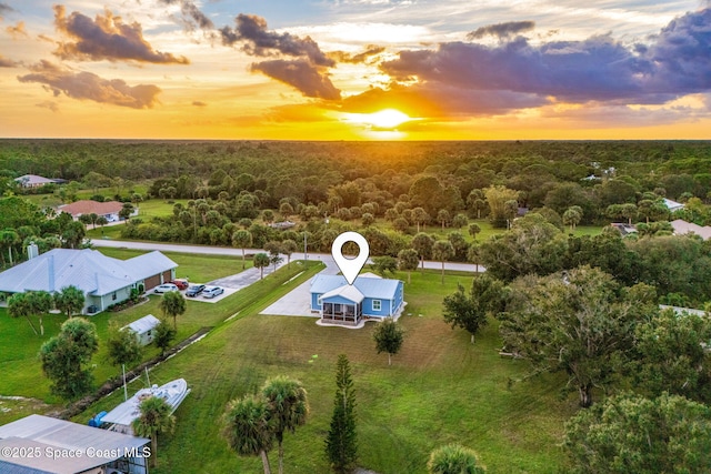 5853 Goldrush Ave, Grant-Valkaria, FL 32949 - aerial view at dusk of a forest view