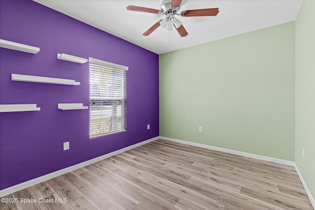 681 Dillard Dr SE, Palm Bay, FL 32909 - empty room featuring wood finished floors, ceiling fan, and baseboards