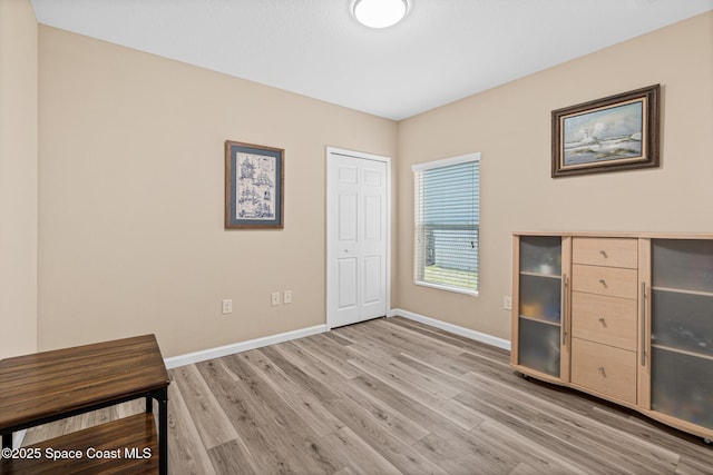 681 Dillard Dr SE, Palm Bay, FL 32909 - unfurnished office featuring baseboards and wood finished floors