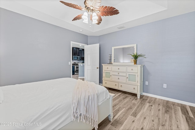 681 Dillard Dr SE, Palm Bay, FL 32909 - bedroom featuring light wood-style floors, baseboards, and ceiling fan