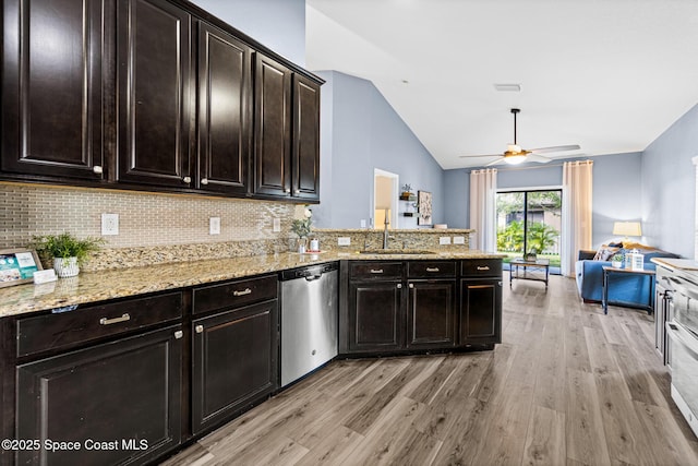 681 Dillard Dr SE, Palm Bay, FL 32909 - kitchen with dishwasher, a sink, lofted ceiling, light wood-type flooring, and ceiling fan