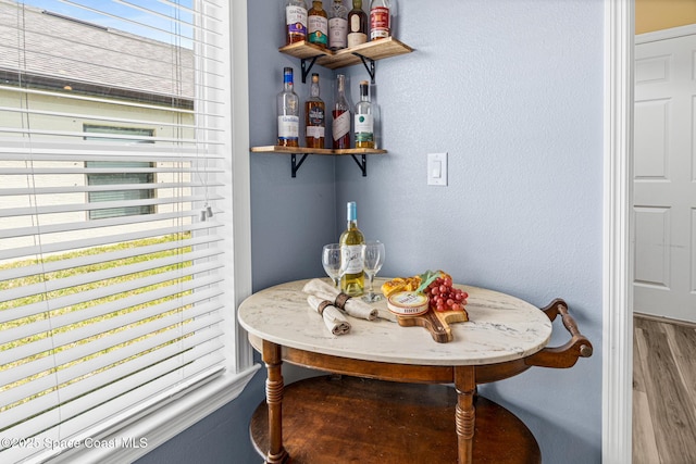 681 Dillard Dr SE, Palm Bay, FL 32909 - detailed view of wood finished floors and a bar