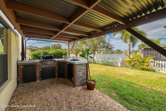 681 Dillard Dr SE, Palm Bay, FL 32909 - view of patio with a water view
