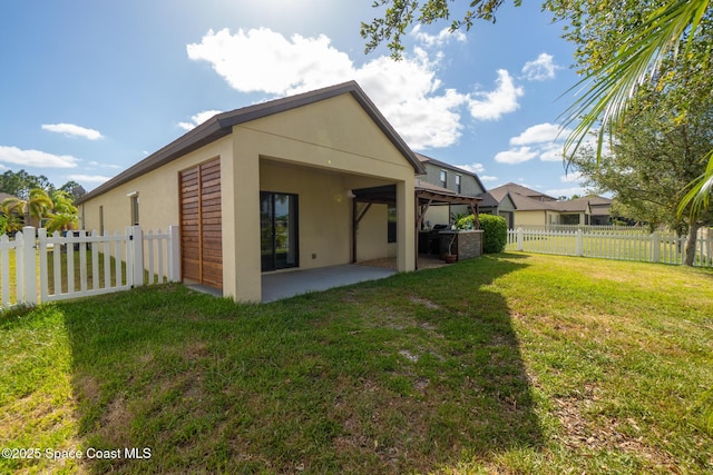 681 Dillard Dr SE, Palm Bay, FL 32909 - back of house featuring a patio and stucco siding