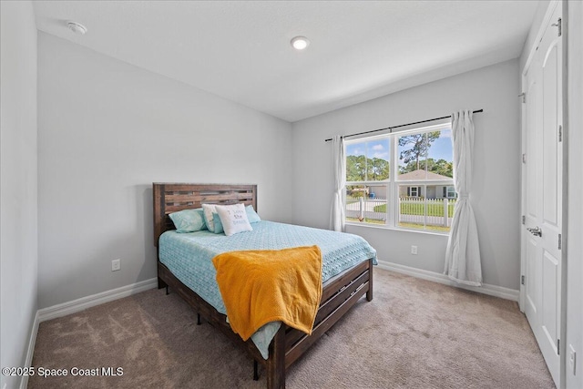 1160 Larkspur St SE, Palm Bay, FL 32909 - carpeted bedroom featuring baseboards